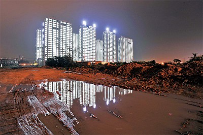 >樓市泡沫將破？ 大陸兩經濟學者博鰲打賭